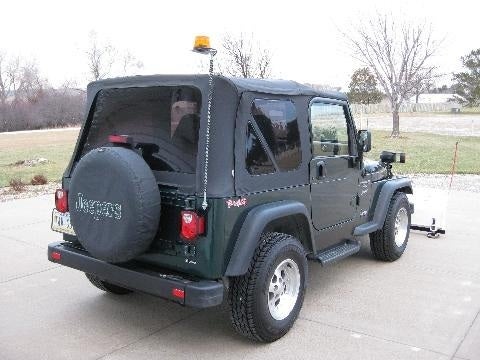 Yellow strobe light mount on Jeep Soft Top | Snow Plowing Forum